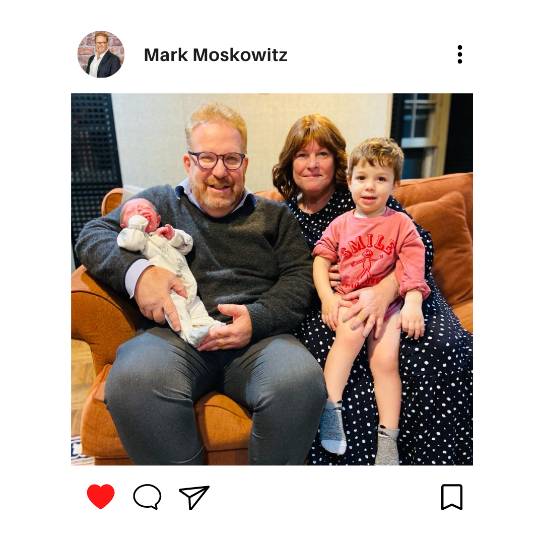 Mark with his wife and grandkids